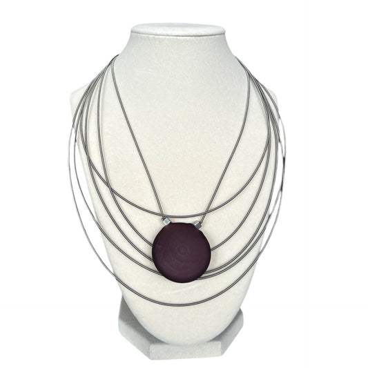 Elegant Murano glass necklace with deep purple pendant and layered silver wires, sold at Aqualta