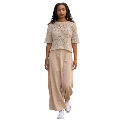 Women wearing a knit Mesh Crop top Short sleeves beige sold at Aqualta 2