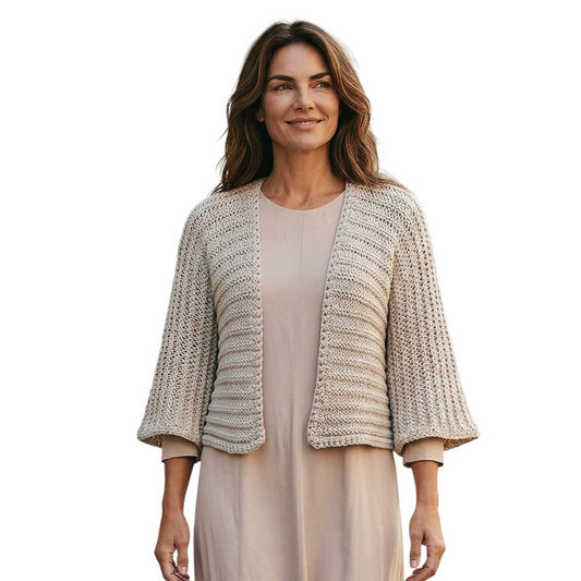 Woman wearing a textured knit Shrug Beige Chiara Toffanin Sold at Aqualta