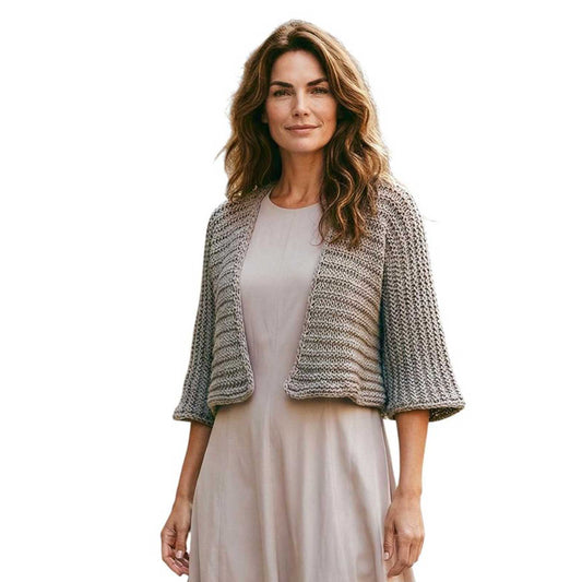 Woman wearing a textured knit Shrug taupe Chiara Toffanin Sold at Aqualta