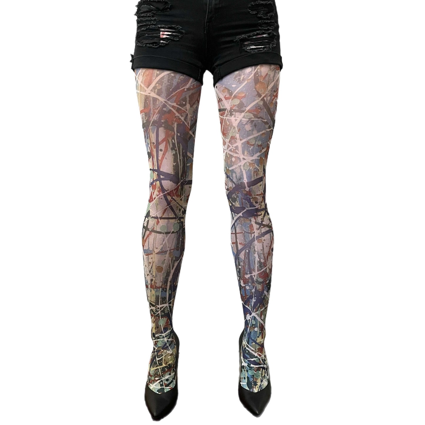Woman wearing abstract paint-splatter patterned tights by Sinclair The Vandal, designed for Malka Chic and made in Italy. 2