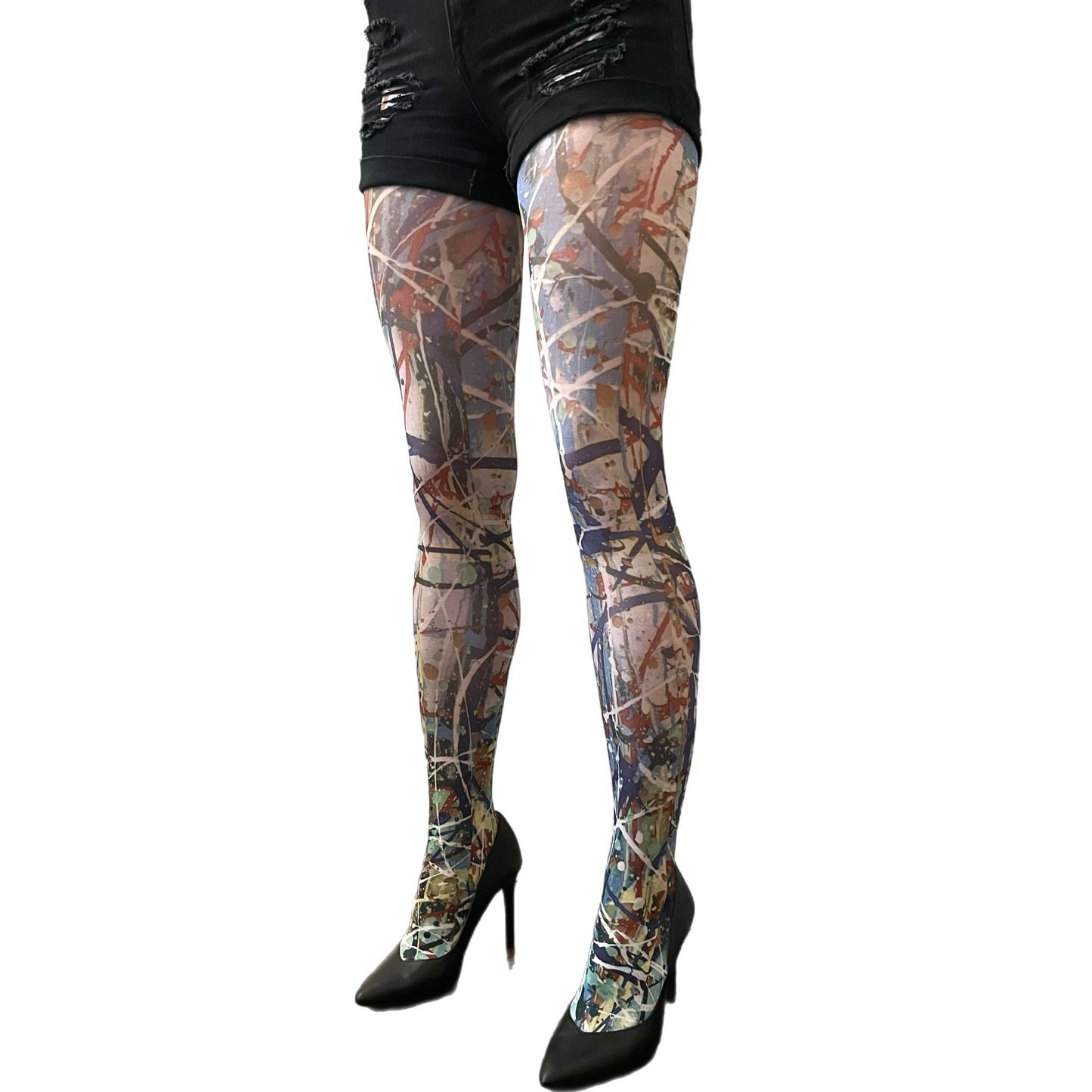 Woman wearing abstract paint-splatter patterned tights by Sinclair The Vandal, designed for Malka Chic and made in Italy.